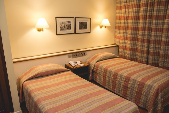 Imagen de la habitación del Hotel DELPLAZA Timbiras São Paulo. Foto 6