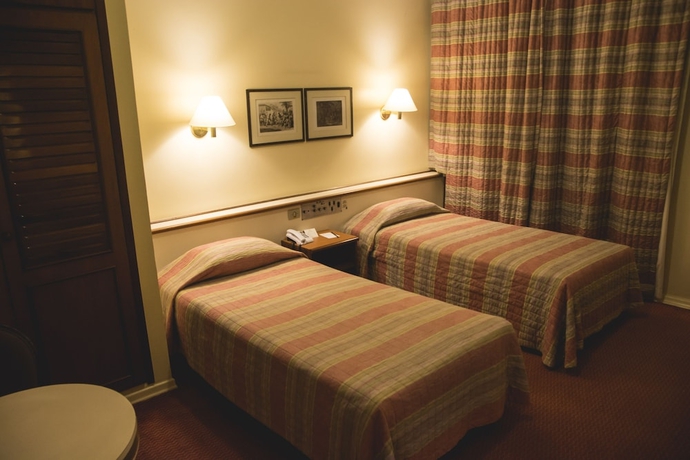 Imagen de la habitación del Hotel DELPLAZA Timbiras São Paulo. Foto 15