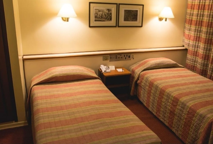 Imagen de la habitación del Hotel DELPLAZA Timbiras São Paulo. Foto 17