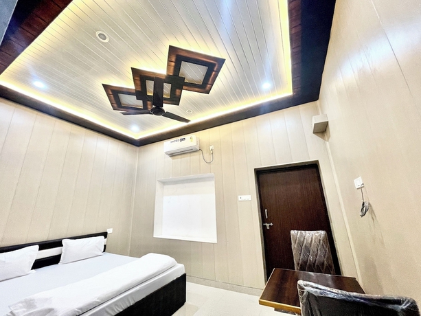 Imagen de la habitación del Hotel DEV VILLA GUEST HOUSE - VARANASI. Foto 8