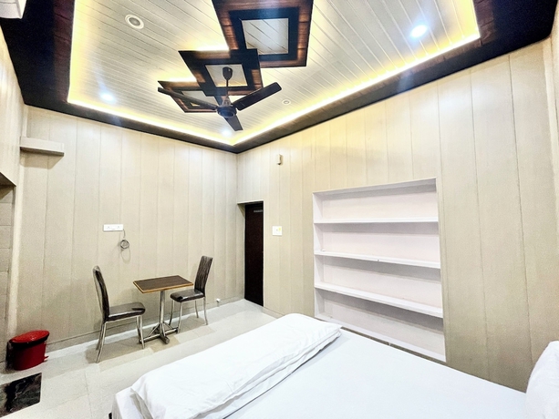 Imagen de la habitación del Hotel DEV VILLA GUEST HOUSE - VARANASI. Foto 11