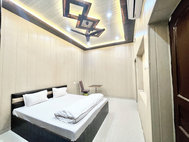Imagen de la habitación del Hotel DEV VILLA GUEST HOUSE - VARANASI. Foto 12