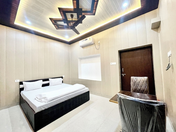 Imagen de la habitación del Hotel DEV VILLA GUEST HOUSE - VARANASI. Foto 13