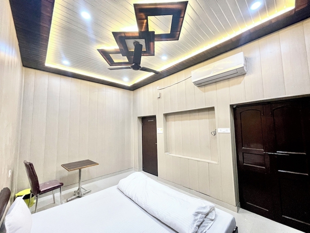 Imagen de la habitación del Hotel DEV VILLA GUEST HOUSE - VARANASI. Foto 14