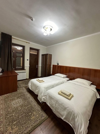 Imagen de la habitación del Hotel DILSHODA. Foto 6