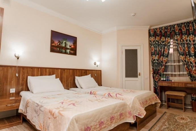 Imagen de la habitación del Hotel DILSHODA. Foto 12