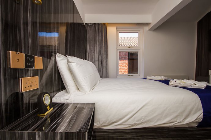 Imagen de la habitación del Hotel DJ Suites Blackpool. Foto 2
