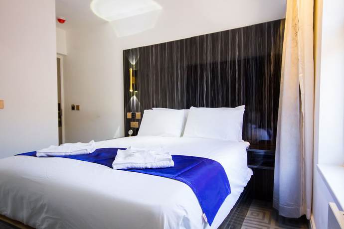 Imagen de la habitación del Hotel DJ Suites Blackpool. Foto 9