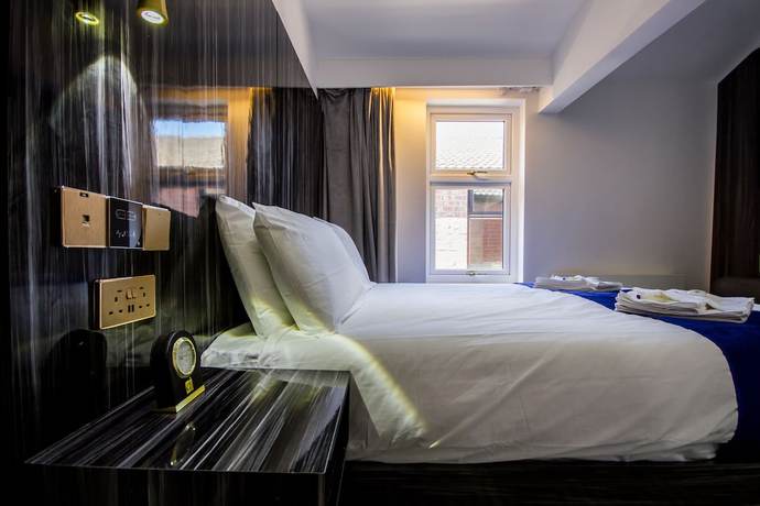 Imagen de la habitación del Hotel DJ Suites Blackpool. Foto 10
