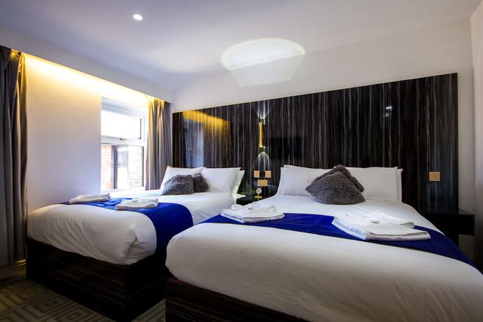 Imagen de la habitación del Hotel DJ Suites Blackpool. Foto 13