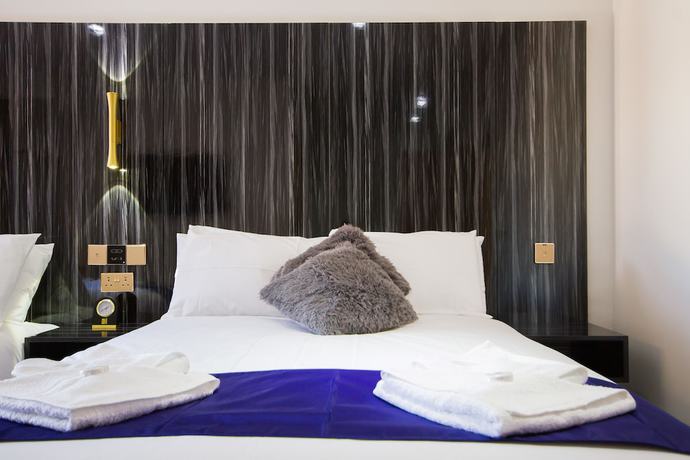 Imagen de la habitación del Hotel DJ Suites Blackpool. Foto 15