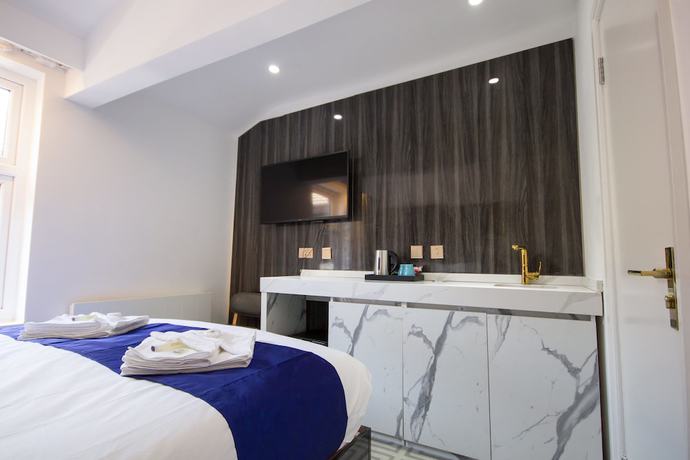 Imagen de la habitación del Hotel DJ Suites Blackpool. Foto 17