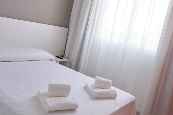 Imagen de la habitación del Hotel DL Port. Foto 19