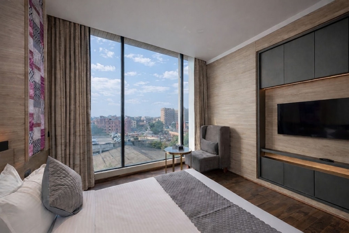 Imagen de la habitación del Hotel DLSs Amritsar. Foto 10