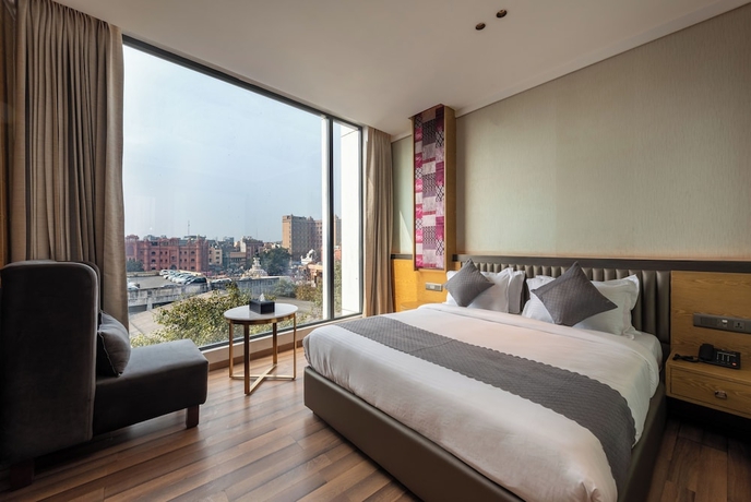 Imagen de la habitación del Hotel DLSs Amritsar. Foto 11