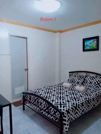 Imagen de la habitación del Hotel DMC Caralos Vacation Inn and Dormitory. Foto 5