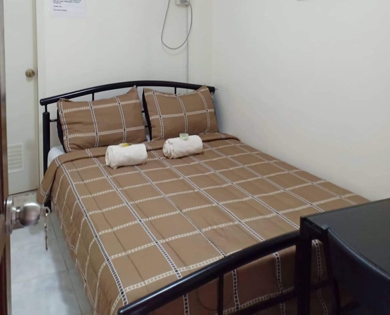 Imagen de la habitación del Hotel DMC Caralos Vacation Inn and Dormitory. Foto 6