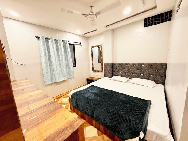 Imagen de la habitación del Hotel DMD Inn near Temple and Rail Staion. Foto 3