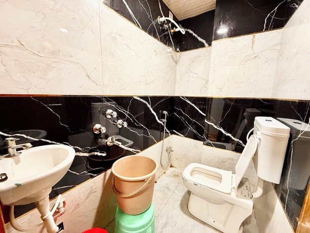 Imagen de la habitación del Hotel DMD Inn near Temple and Rail Staion. Foto 6