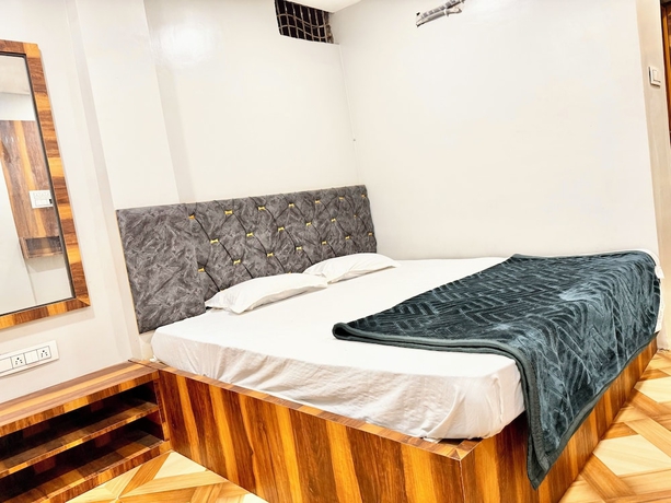 Imagen de la habitación del Hotel DMD Inn near Temple and Rail Staion. Foto 8