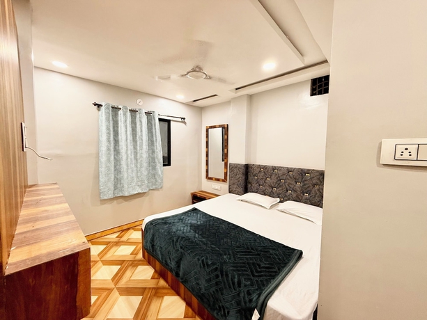 Imagen de la habitación del Hotel DMD Inn near Temple and Rail Staion. Foto 9