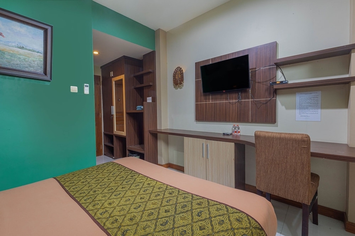 Imagen de la habitación del Hotel D\'Madinah Inn - Gentan. Foto 2