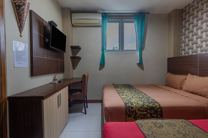 Imagen de la habitación del Hotel D\'Madinah Inn - Gentan. Foto 3