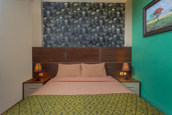 Imagen de la habitación del Hotel D\'Madinah Inn - Gentan. Foto 4