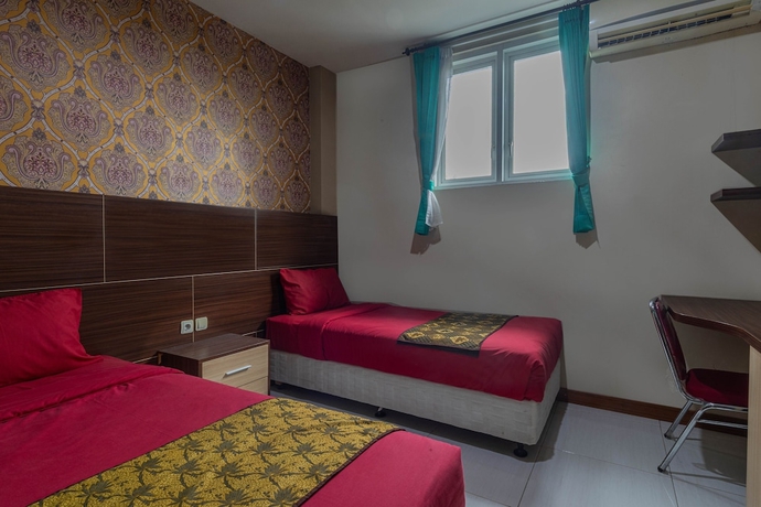 Imagen de la habitación del Hotel D\'Madinah Inn - Gentan. Foto 5