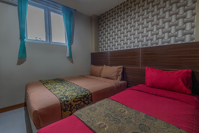 Imagen de la habitación del Hotel D\'Madinah Inn - Gentan. Foto 6
