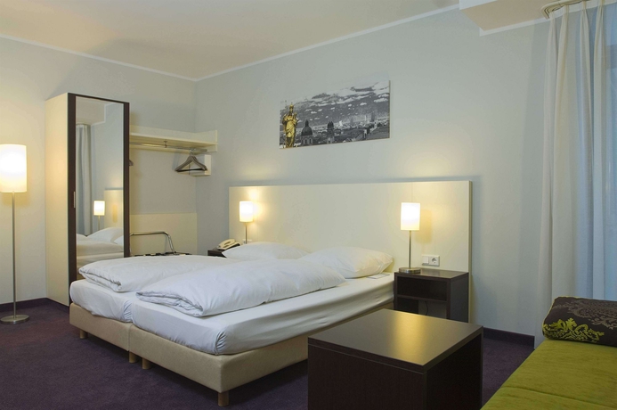 Imagen de la habitación del Hotel DOLOMIT. Foto 6