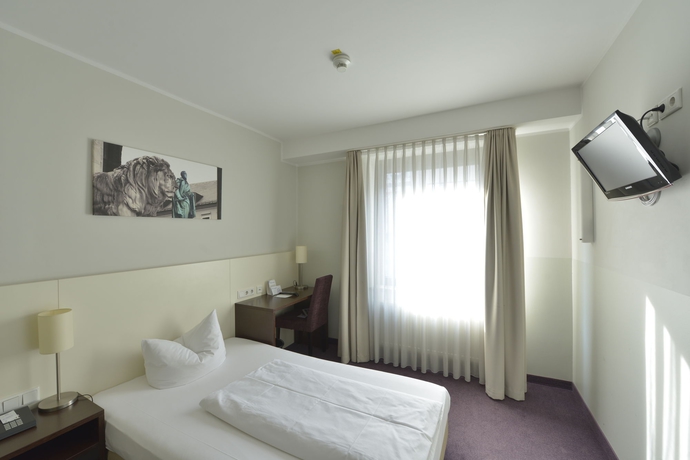 Imagen de la habitación del Hotel DOLOMIT. Foto 7