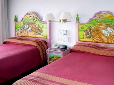 Imagen de la habitación del Hotel DON CENOBIO. Foto 11