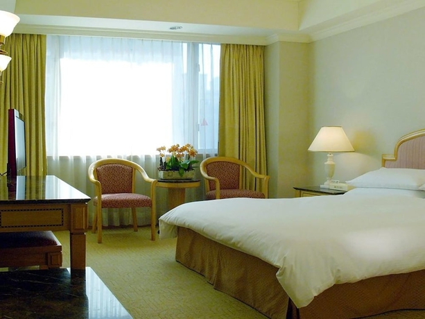 Imagen de la habitación del Hotel DONG WU HOTEL. Foto 10