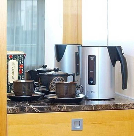 Imagen de la habitación del Hotel DONG WU HOTEL. Foto 11
