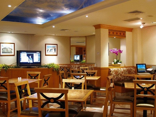 Imagen del bar/restaurante del Hotel DONG WU HOTEL. Foto 5