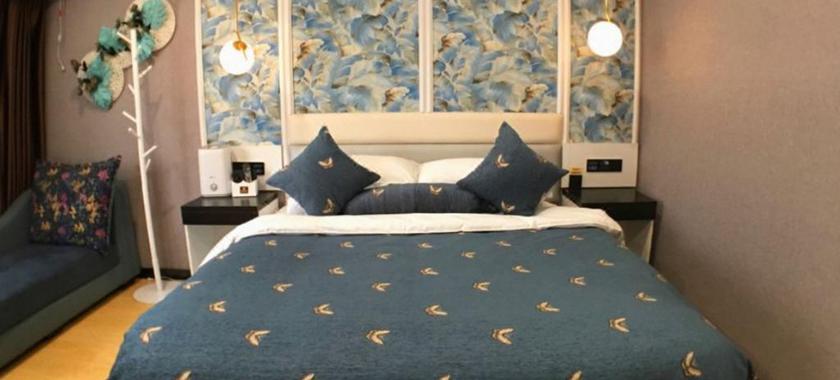 Imagen de la habitación del Hotel DONGBAO HOTEL. Foto 3