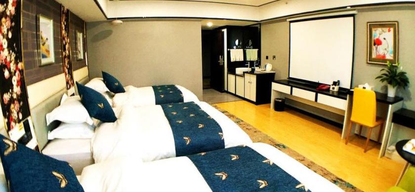 Imagen de la habitación del Hotel DONGBAO HOTEL. Foto 7