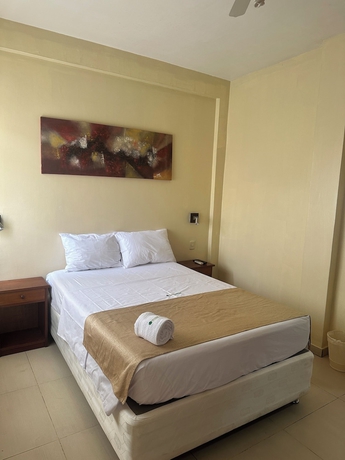 Imagen de la habitación del Hotel DORAL INN HOTEL. Foto 13