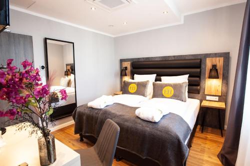 Imagen de la habitación del Hotel DORMERO Bremen. Foto 18