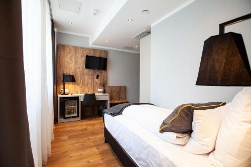 Imagen de la habitación del Hotel DORMERO Bremen. Foto 20
