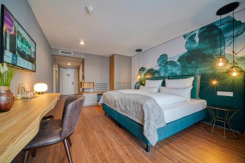 Imagen de la habitación del Hotel DORMERO Freiburg. Foto 5