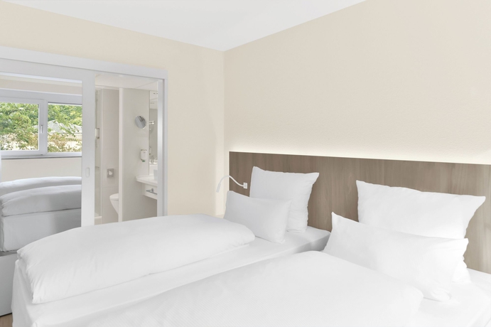 Imagen de la habitación del Hotel DORMERO F&uuml;rth. Foto 10
