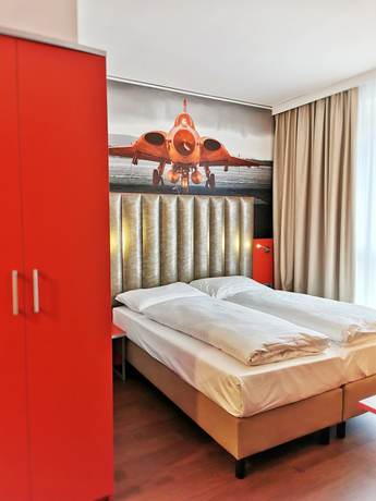 Imagen de la habitación del Hotel DORMERO JeHo Graz Airport. Foto 6