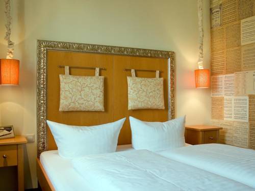 Imagen de la habitación del Hotel DORMERO Kehl. Foto 5