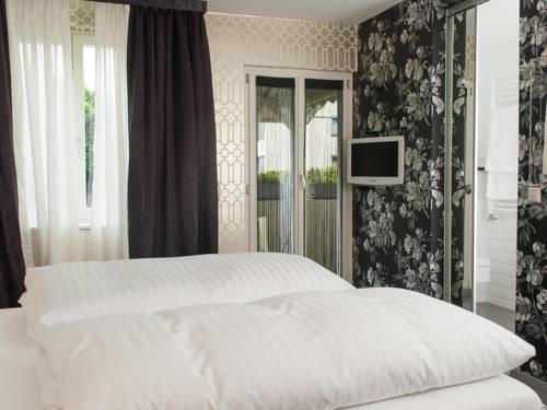 Imagen de la habitación del Hotel DORMERO Kehl. Foto 9