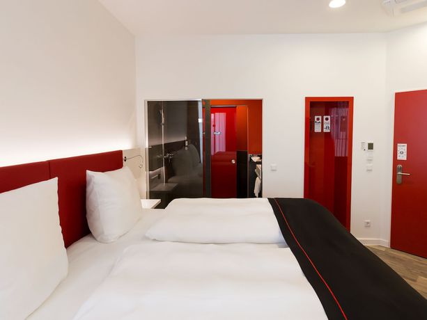 Imagen de la habitación del Hotel DORMERO Roth. Foto 14