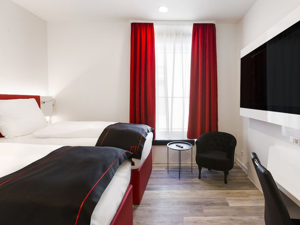 Imagen de la habitación del Hotel DORMERO Roth. Foto 17