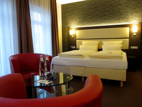 Imagen de la habitación del Hotel DORMERO Werther. Foto 8