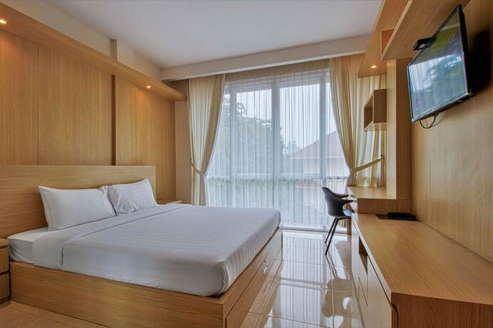 Imagen de la habitación del Hotel D'Padmaya Residence. Foto 3